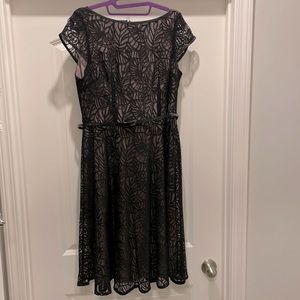 Black lace cap sleeve cocktail dress